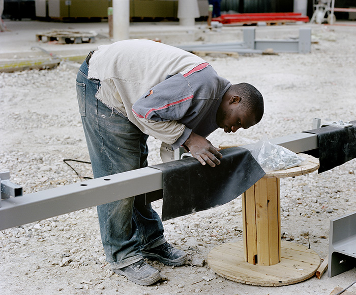 Un compagnon sur le chantier des Archives nationales, Pierrefitte-sur-Seine, 16 juin 2011