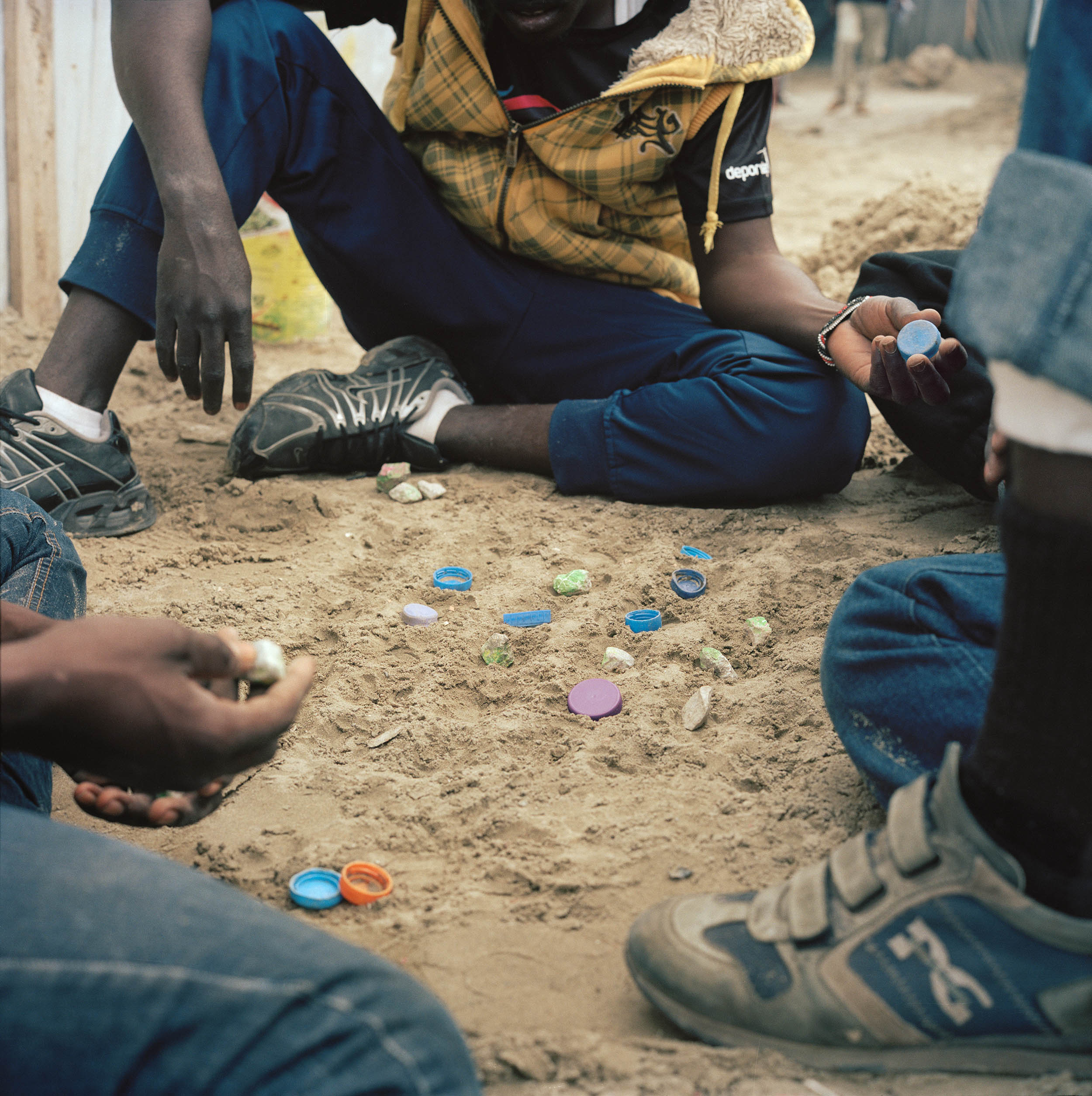 May 9, young Sudanese migrants play dala, northern sector
