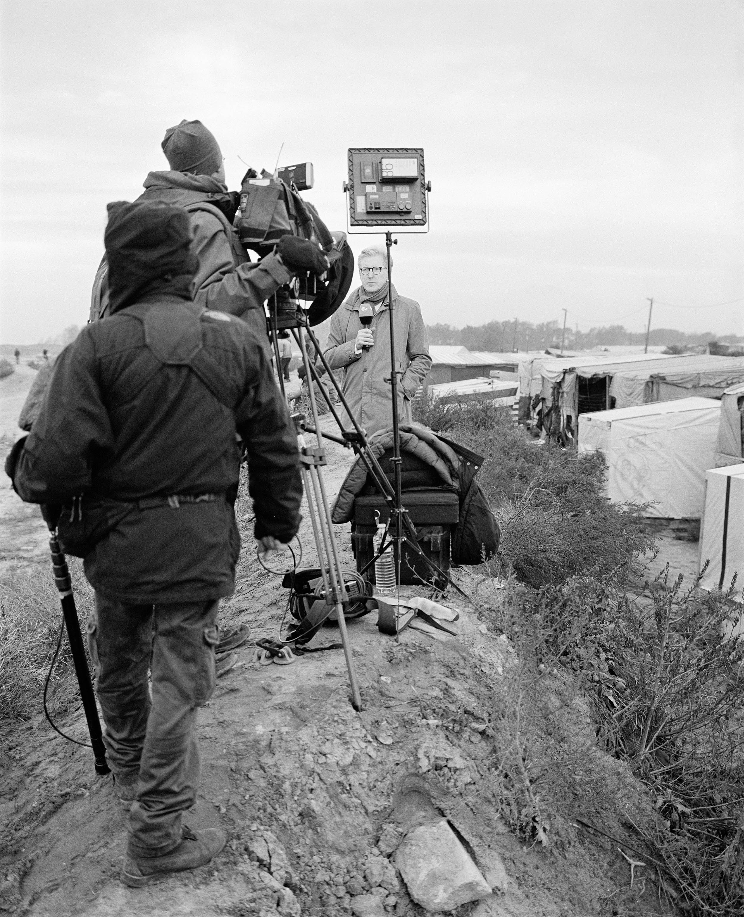 October 23, the day before the evacuation of the Jungle, a German television crew shoots for the evening news