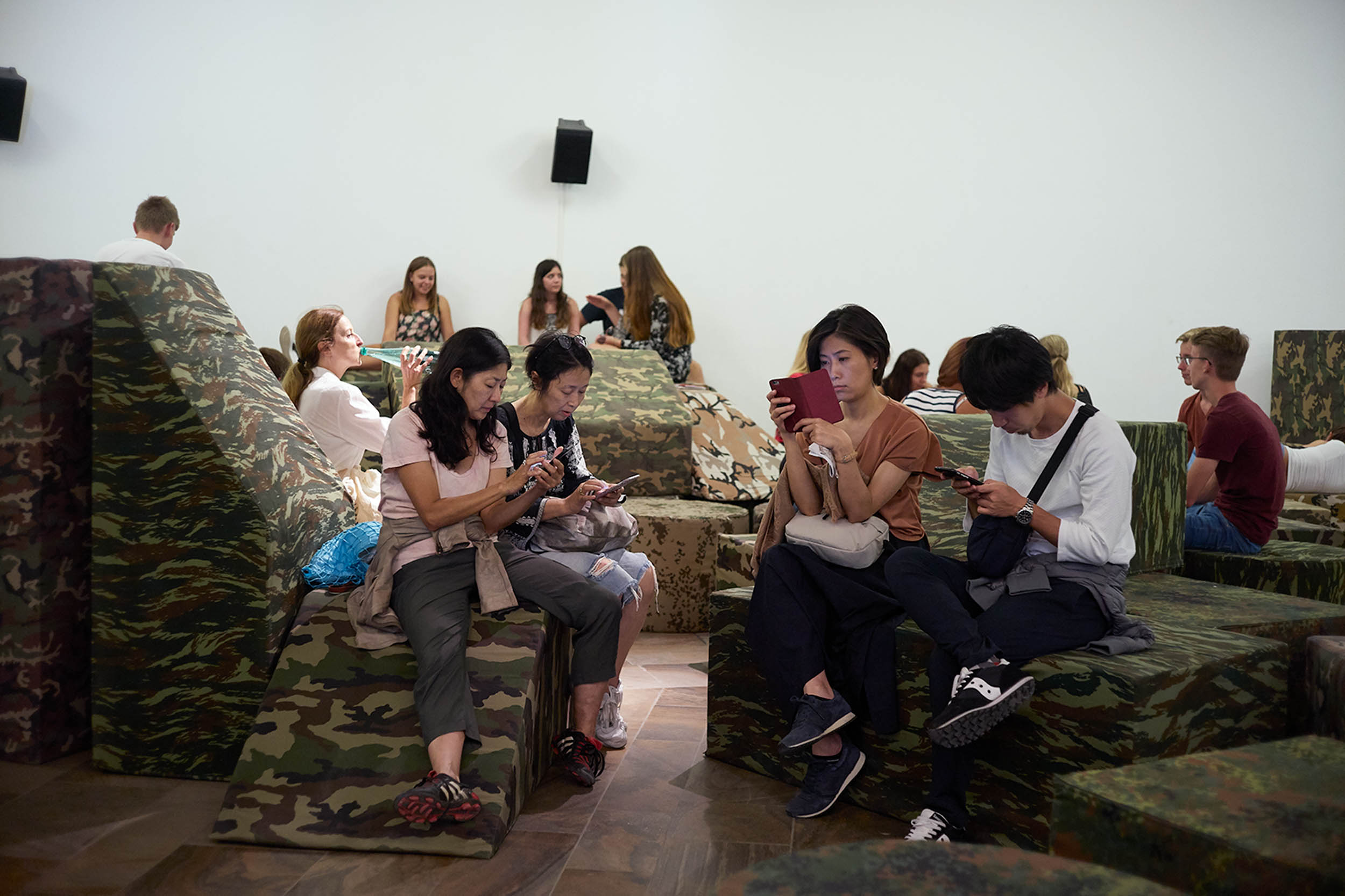 Visitors sitting on Polemos by Andreas Angelidakis, Fridericianum, Kassel, 2017