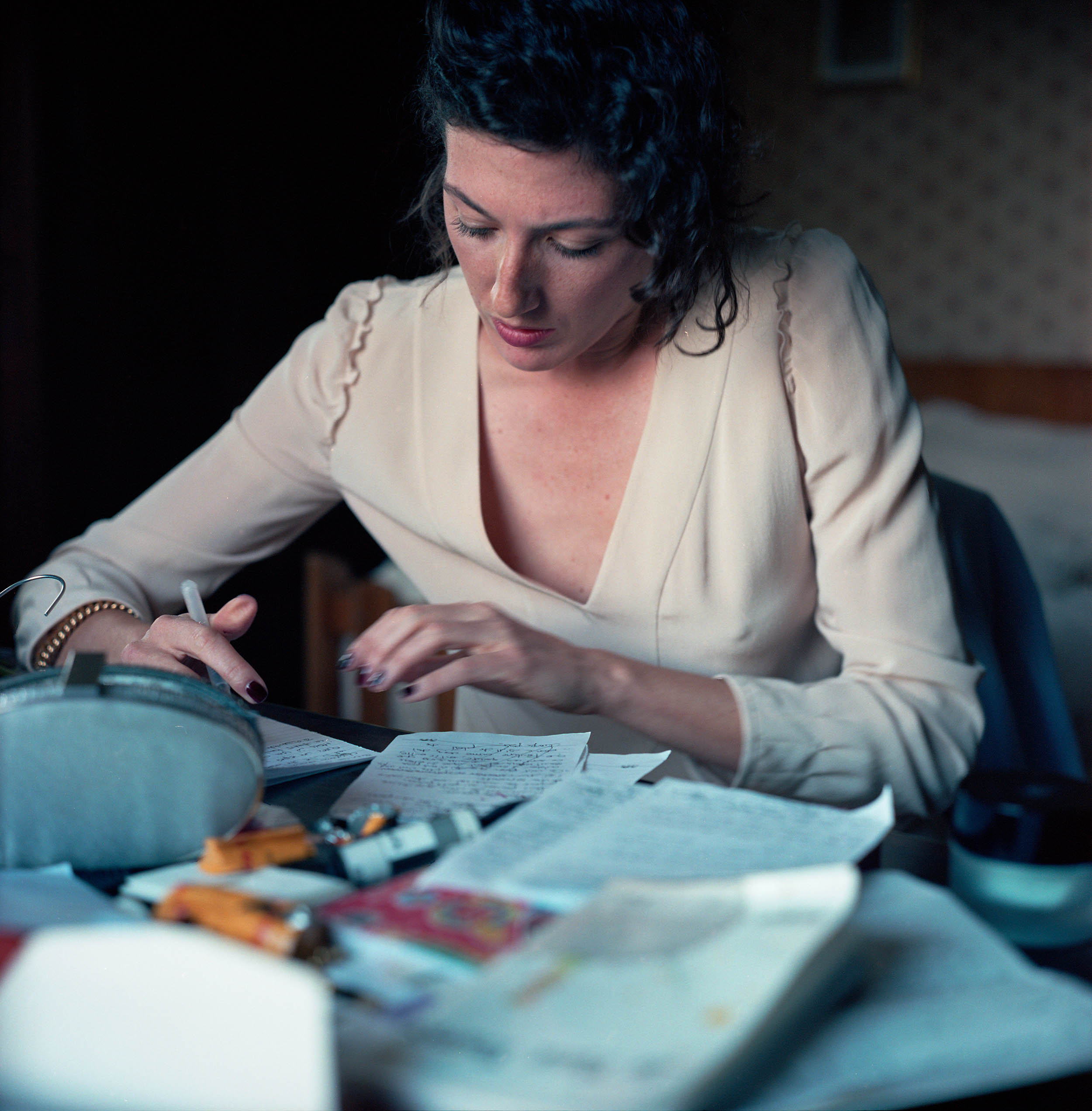 Francesca writing a speech for Fred's wedding, France, 2011