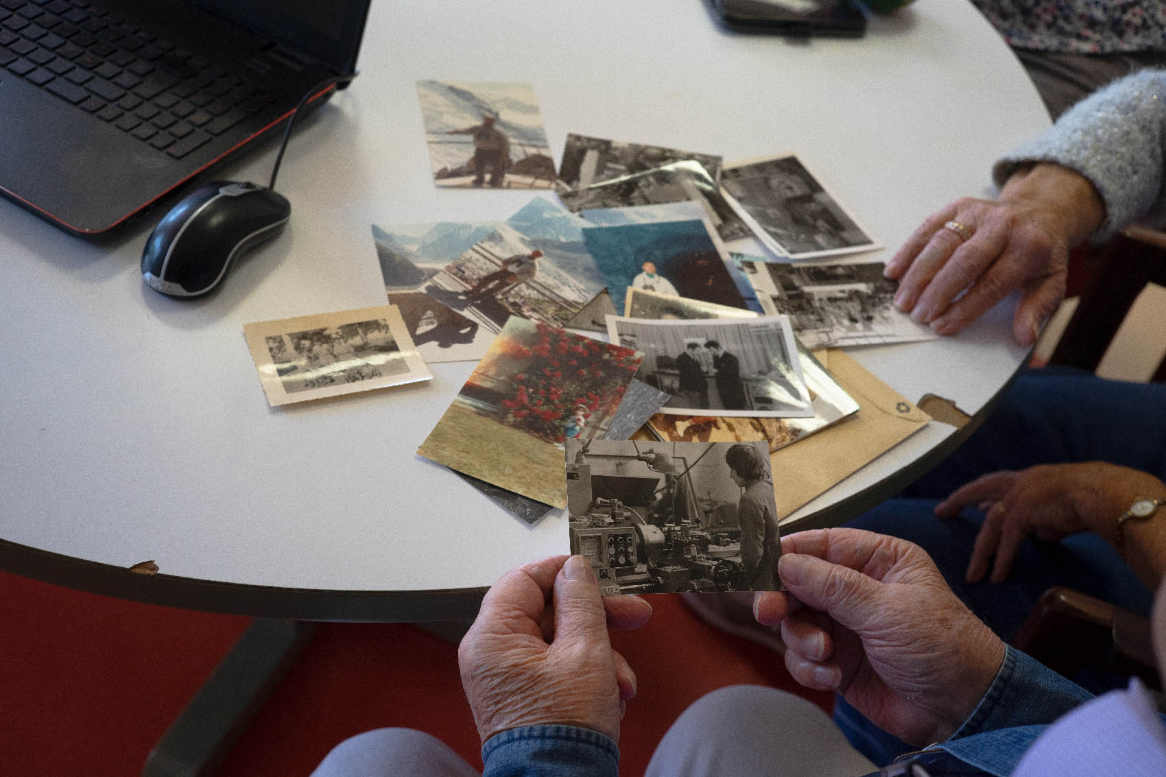 Looking at family photographs together // Cherbourg-en-Cotentin, 2019